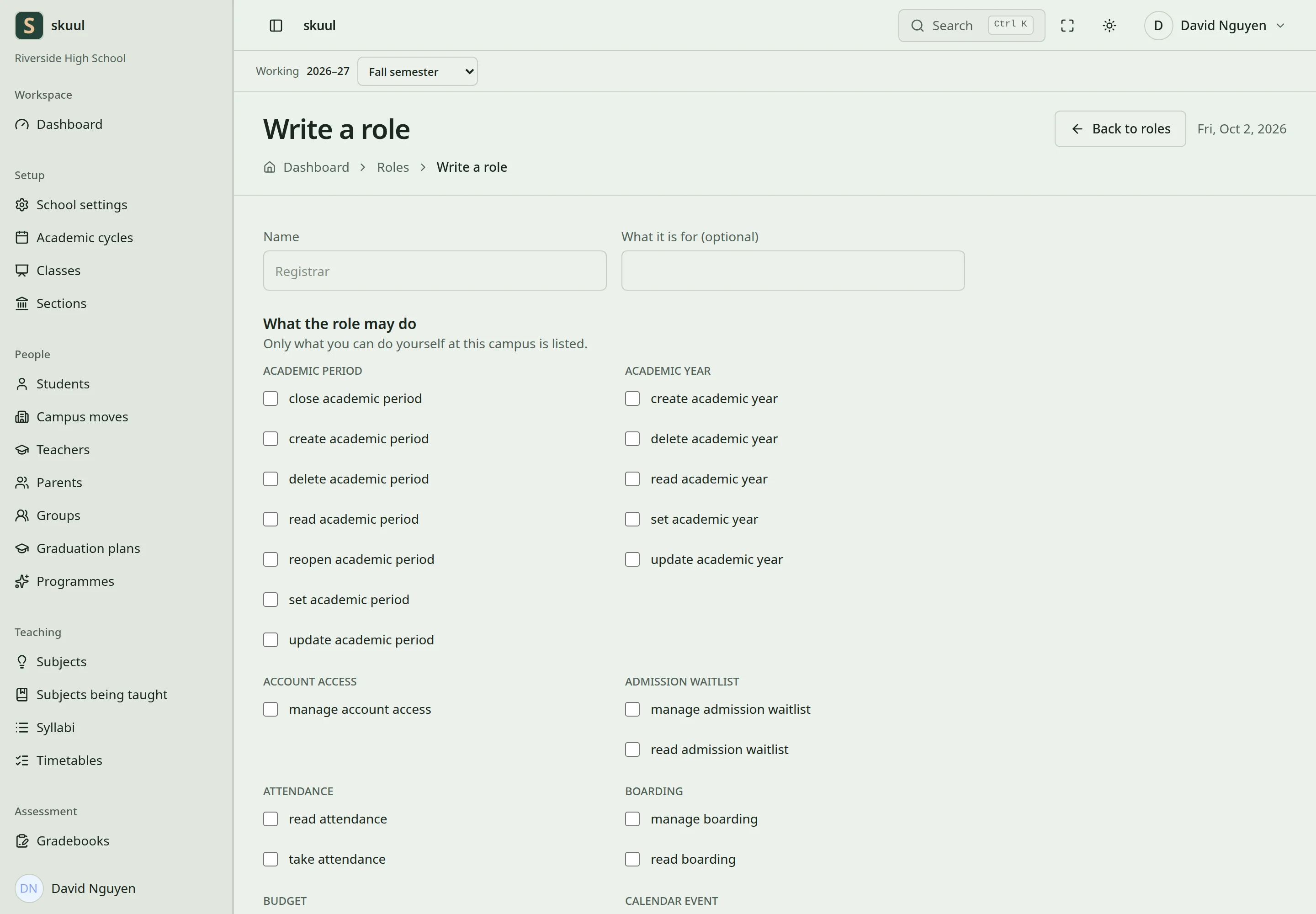 The role form has a name field and permission check boxes grouped by area.