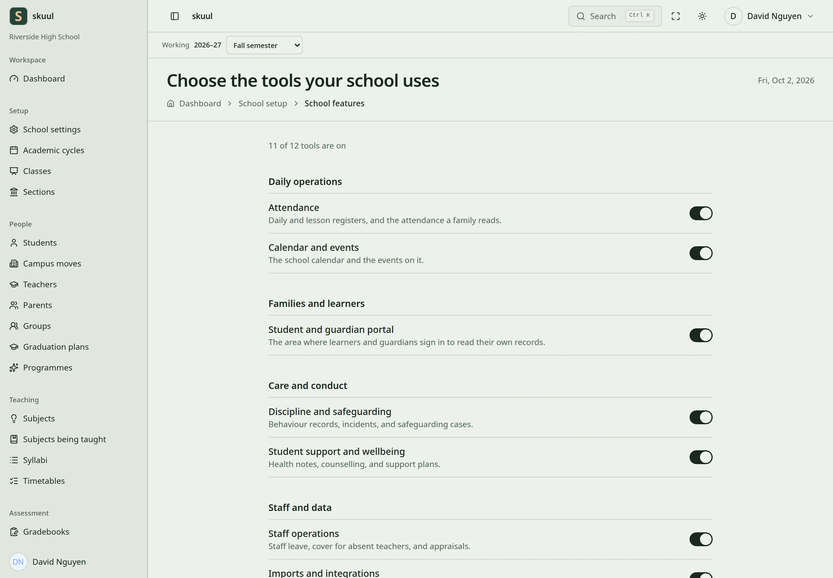 Feature switches list the tools the school uses, grouped by area, with 11 of 12 turned on.